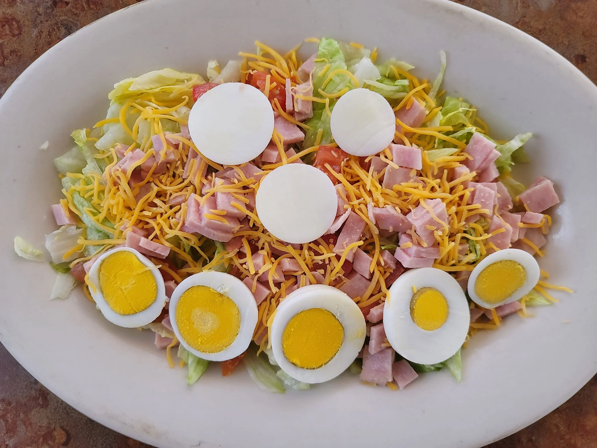 Chef Salad - Fresh chef salad with ham, turkey, cheese and hard-boiled egg.