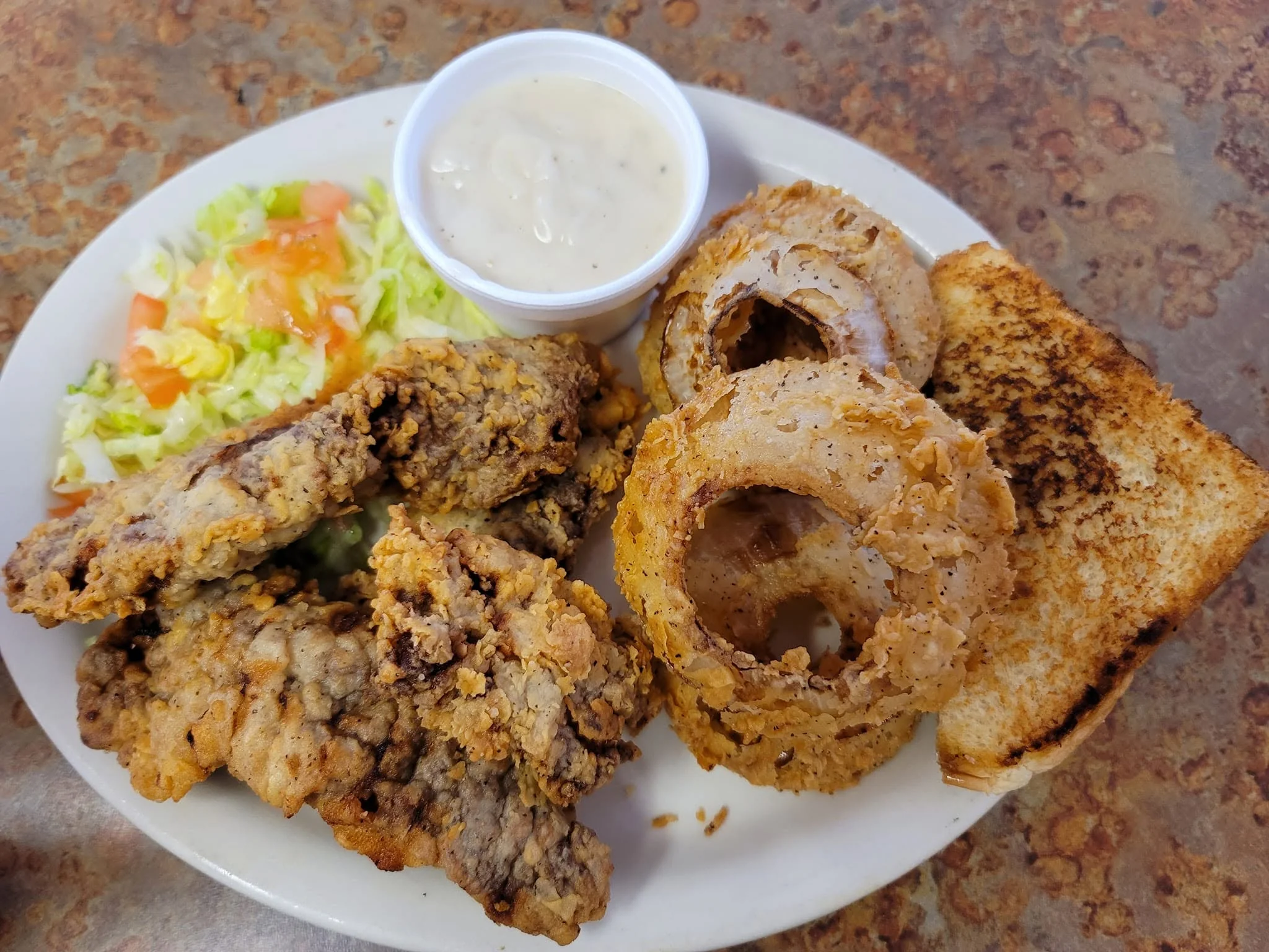 Steak Fingers - Crispy breaded steak fingers, a Hi-Neighbor favorite.